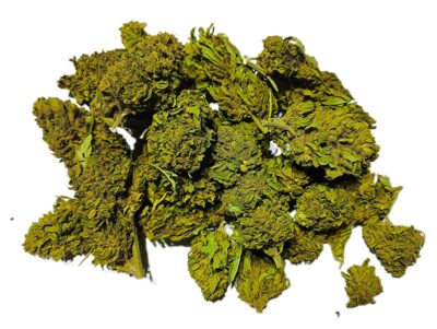 A pile of dried Chyll Flower Weed buds with green leaves and dense texture.